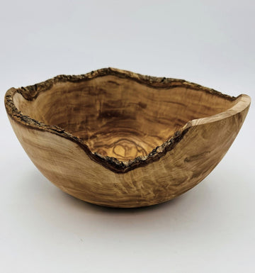 Rustic salad bowl made of natural olive wood