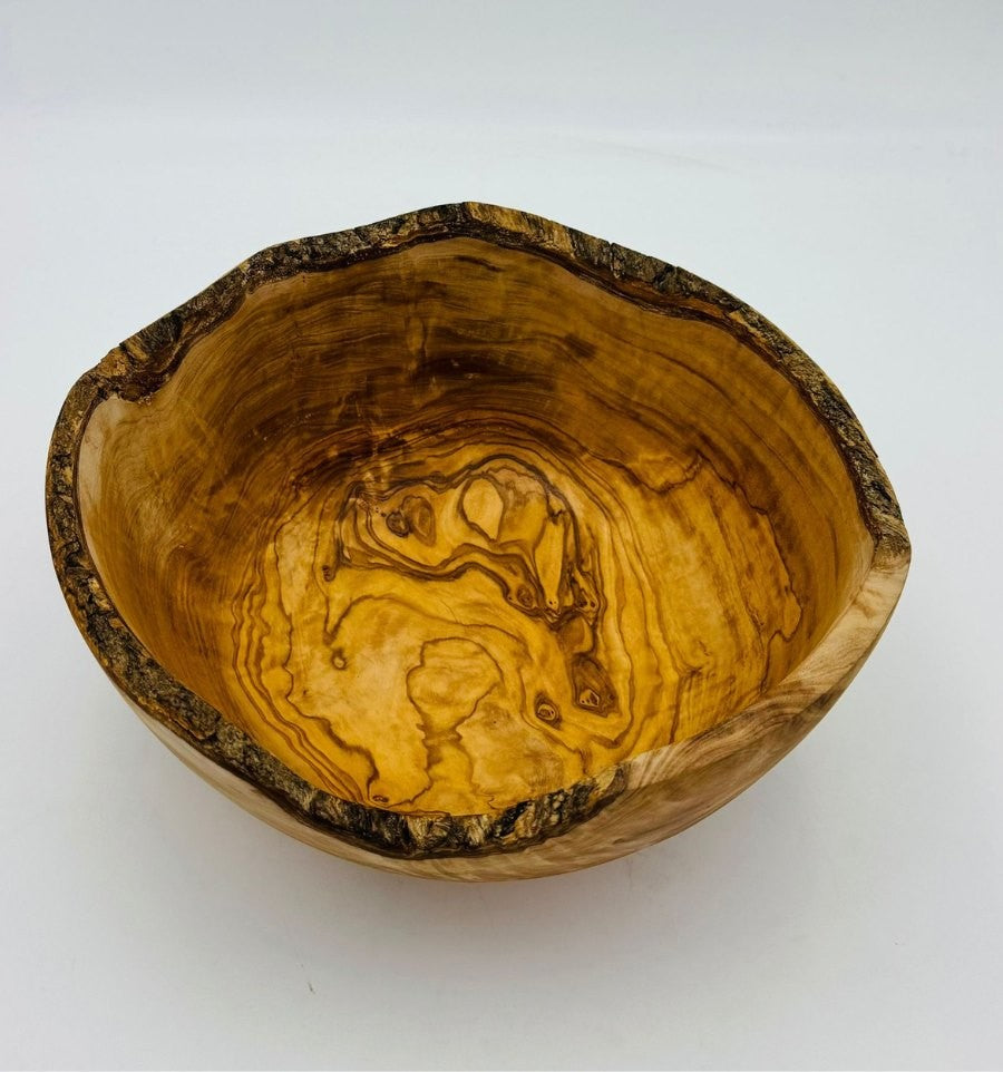 Rustic salad bowl made of natural olive wood